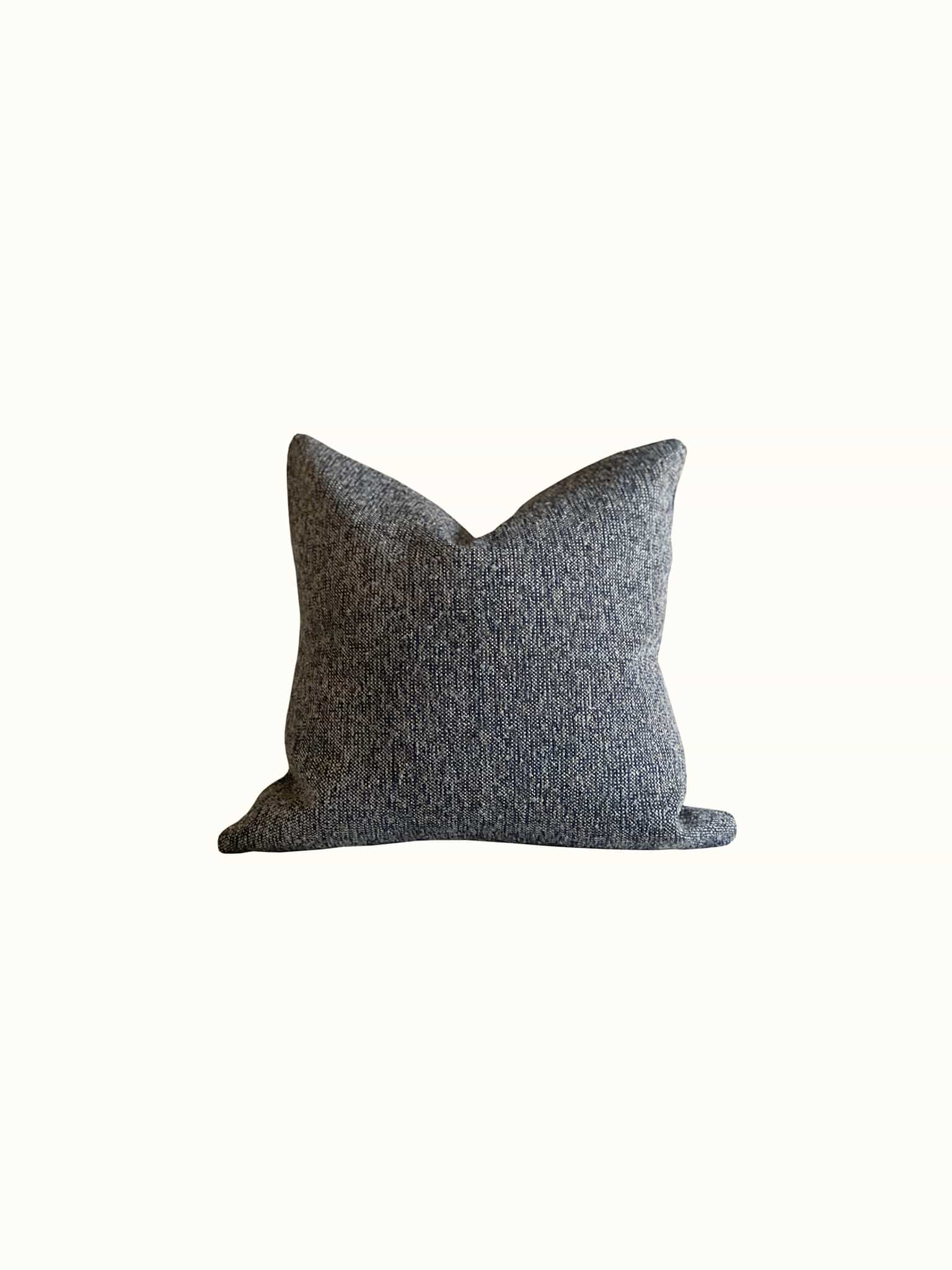Dark blue boucle square pillow in midcentury modern style at Cielle Home