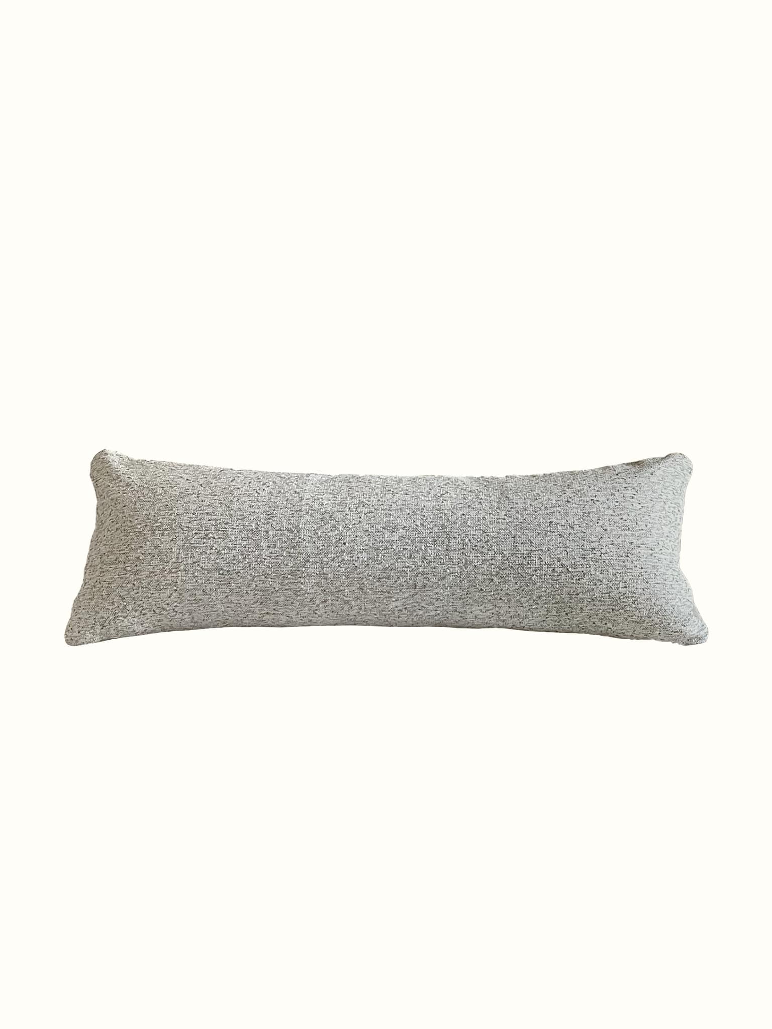 Oversized lumbar pillow at Cielle Home in speckled brown interwoven boucle fabric