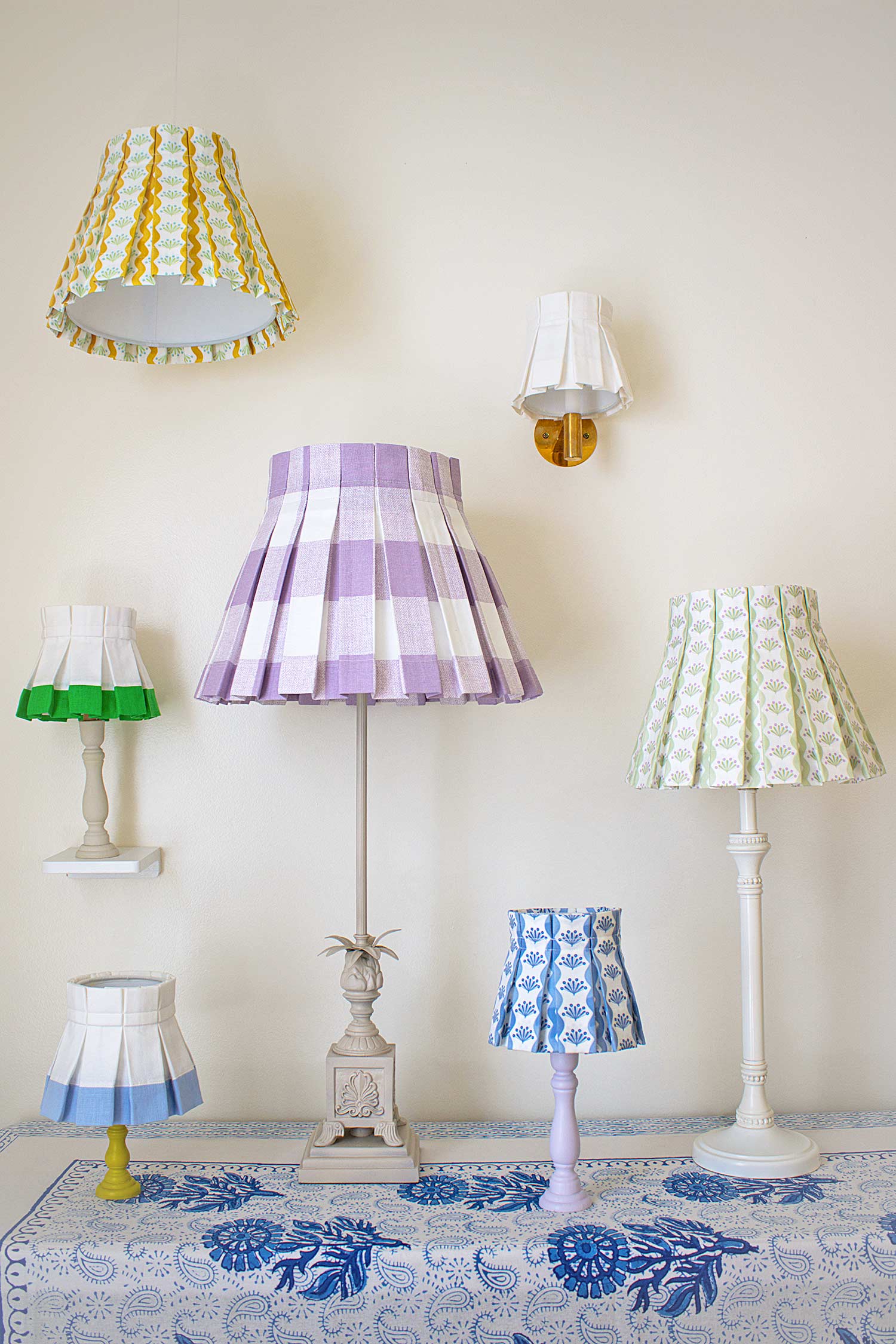 Modern box pleat lampshade in floral patterns, pastel colors, and classic plaid and stripes.
