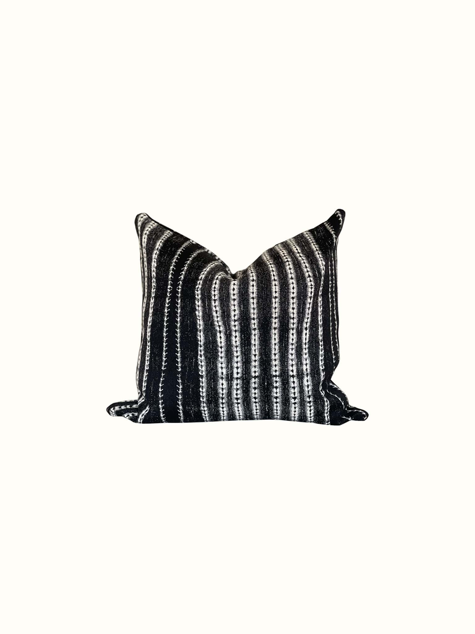 Unbalanced striped throw pillow in black and white gives modern fair at Cielle Home