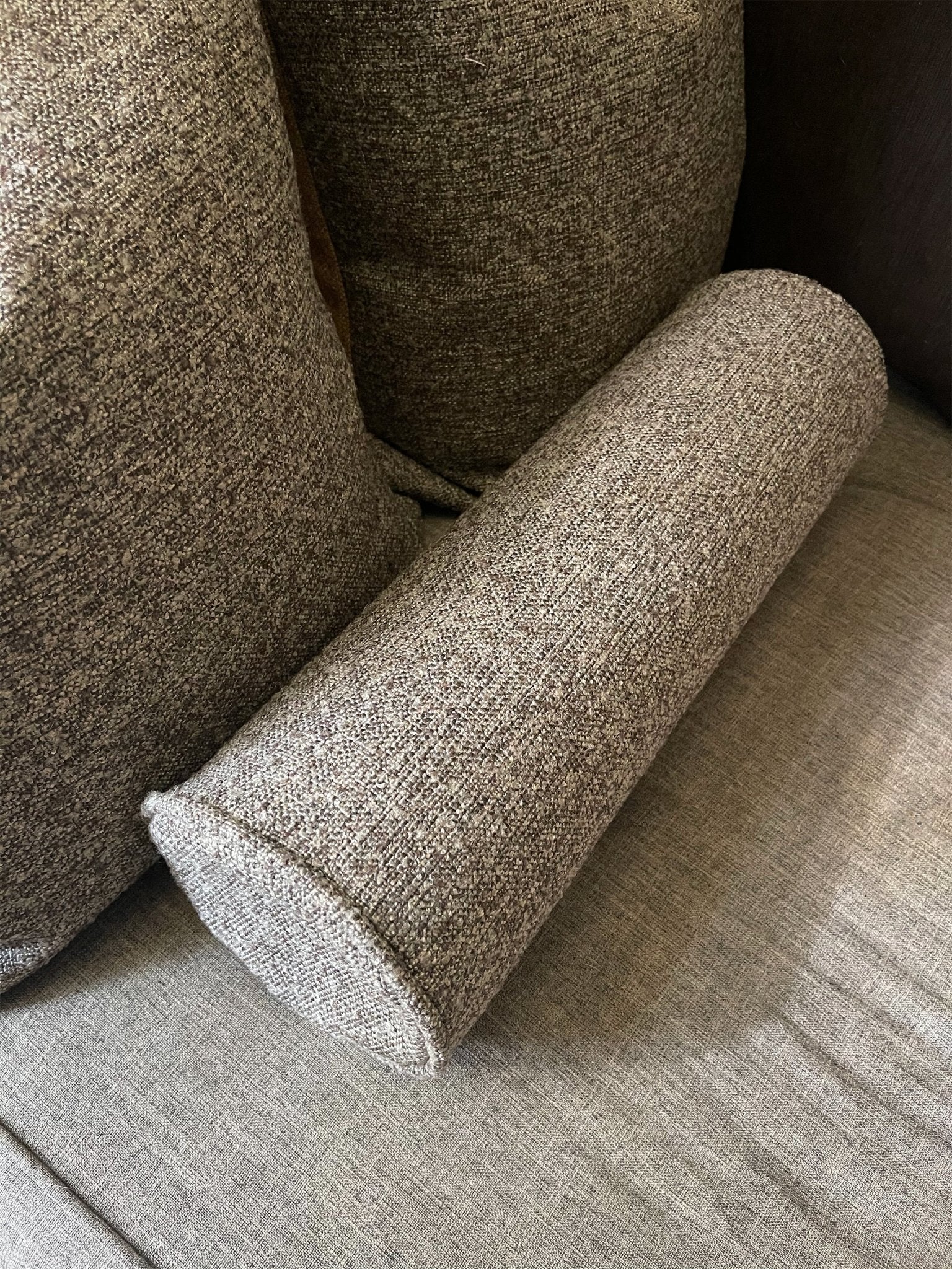 Classic boucle bolster pillow in cozy fabric comes in multiple colorways, perfect for all seasons