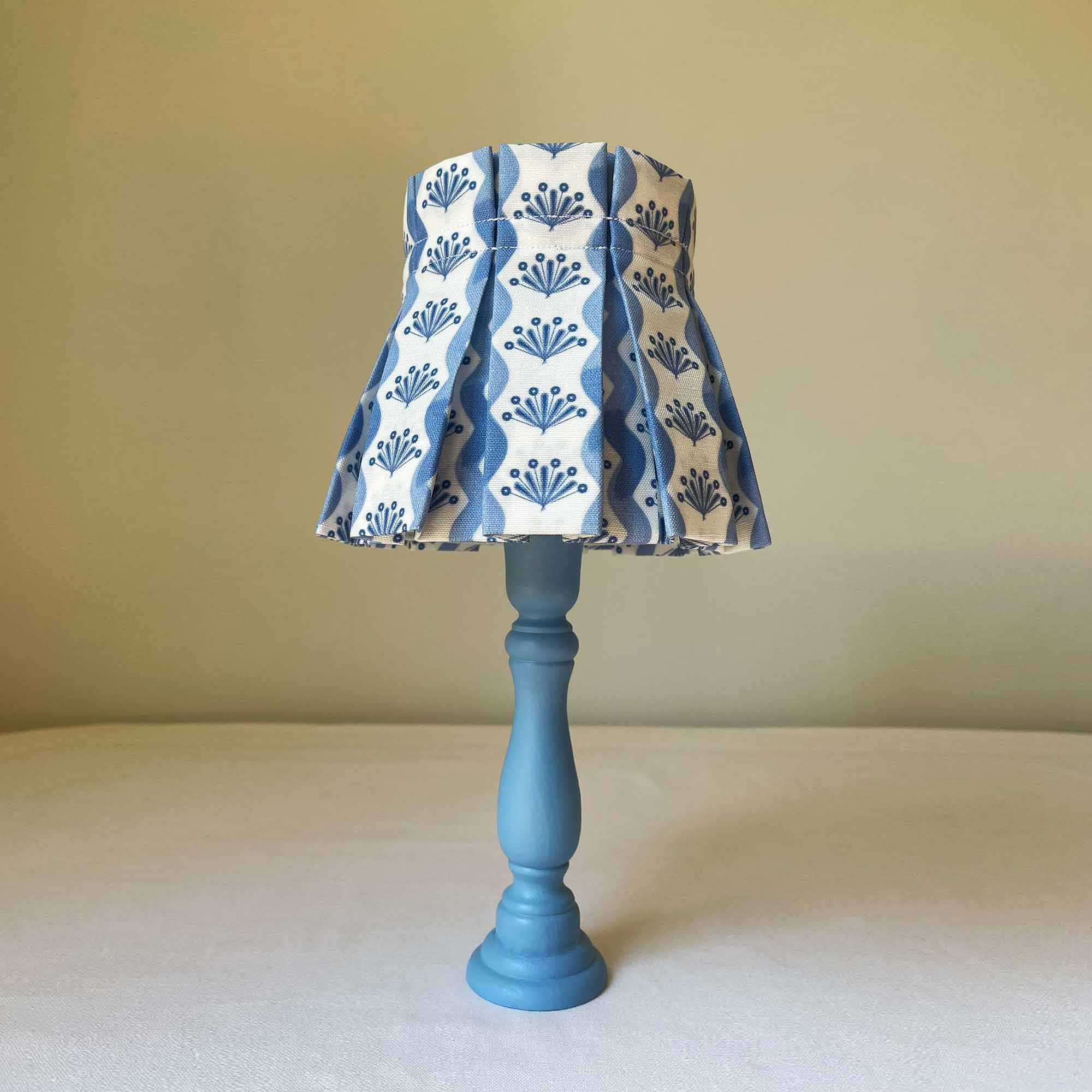 cute vibrant rich blue floral lampshade in pleat style and perfect for wall scones and tiny table lamps