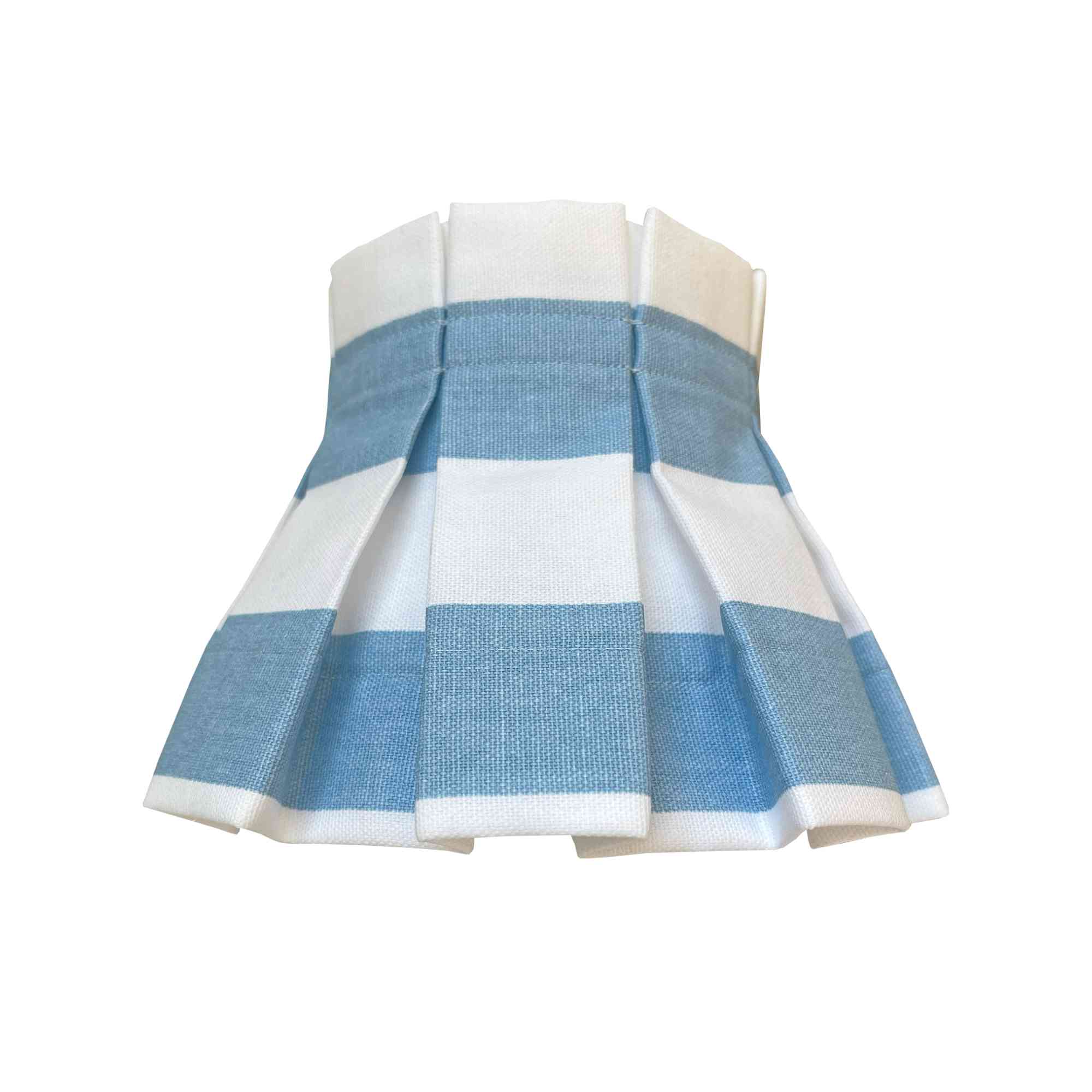 white and blue striped lampshade in pleated style brings a clean and coastal vibe.